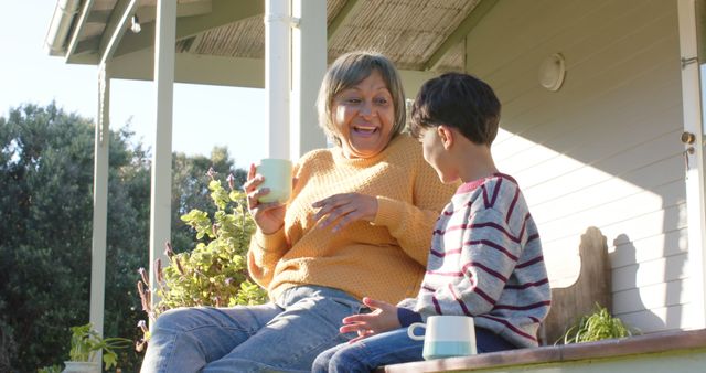 Grandmother and Grandson Laughing Outdoors Enjoying Quality Time - Download Free Stock Images Pikwizard.com