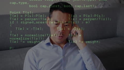 Business Professional Analyzing Data During Phone Call