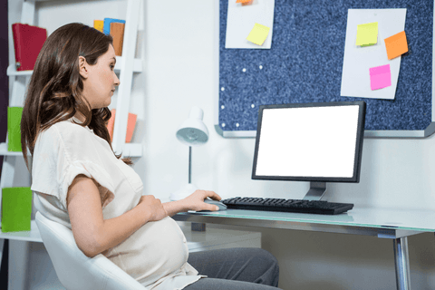 pregnant woman working at desk in transparent home office - Download Free Stock Videos Pikwizard.com