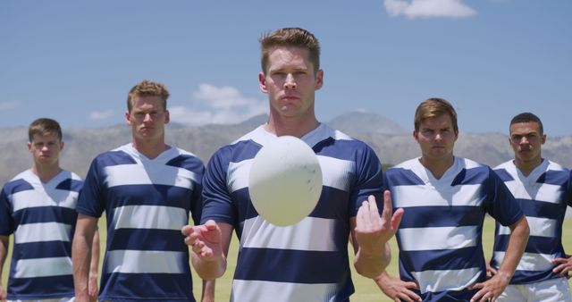 Rugby Players Ready for Game Day Holding Ball Outdoors - Download Free Stock Images Pikwizard.com