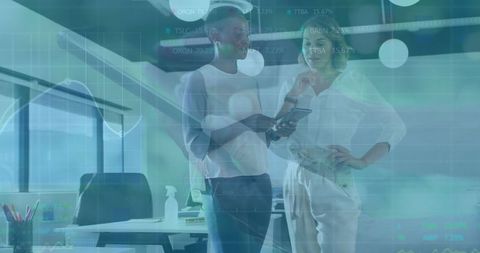 Businesswomen Analyzing Financial Data with Digital Technology