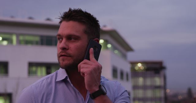 Businessman Using Smartphone Outdoors During Evening - Download Free Stock Images Pikwizard.com