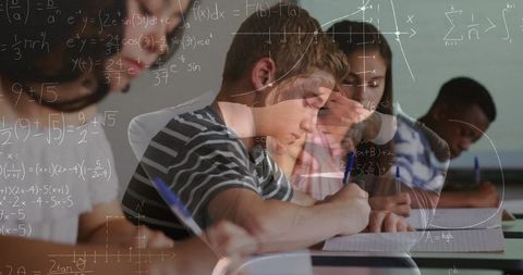 Diverse students concentrated on solving math problems in classroom