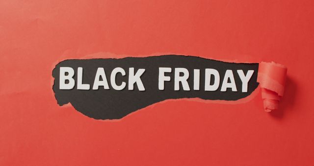 Ripped red paper with black friday text in white on red background. Black friday, shopping, sale and retail concept digitally generated image.