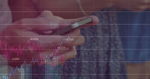 Close-up of business people analyzing financial mobile data