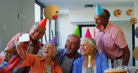 Joyful Seniors Celebrating Birthday with Selfie and Fun Emojis - Download Free Stock Images Pikwizard.com