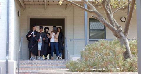 Diverse Group of High School Graduates Celebrating Milestone Achievement