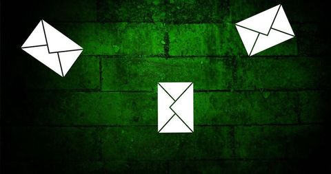 Floating Envelopes on Brick Background Symbolizing Communication