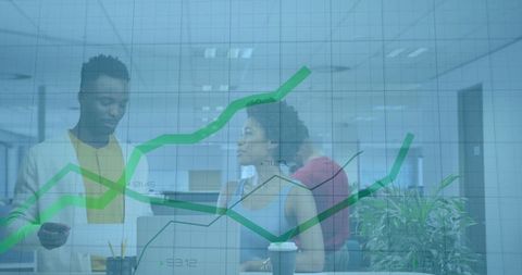 Professionals analyzing data with growth chart in modern office