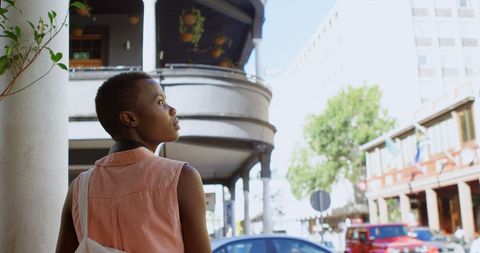 Pensive African American Woman Exploring Busy Urban Street - Download Free Stock Images Pikwizard.com