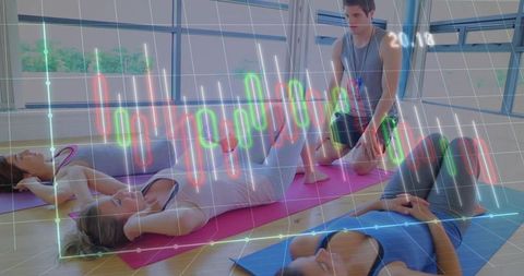 Group Fitness Class Doing Crunches with Trainer and Futuristic Data Overlay
