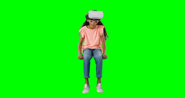 Young Girl Enjoying Virtual Reality with VR Goggles on Green Screen - Download Free Stock Images Pikwizard.com