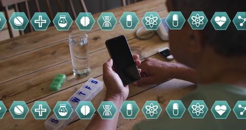 Senior Man Using Smartphone for Health Management at Home - Download Free Stock Images Pikwizard.com