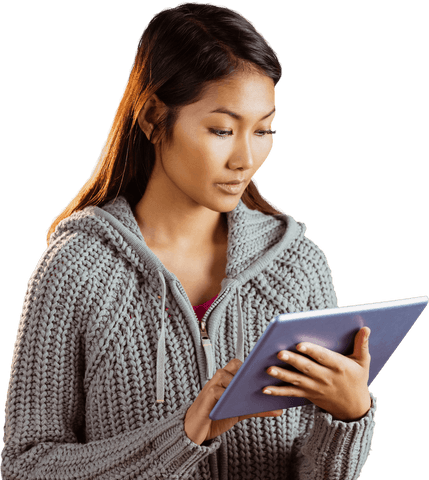 Concentrated Woman in Gray Sweater. Utilizing Tablet Near Transparent Wall