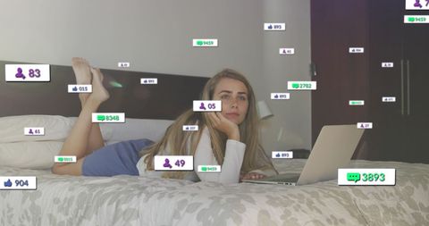 Woman relaxing with laptop amidst social media notification icons