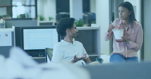 Colleagues Engaging in Office Discussion with Tech Overlay