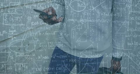 Businessman Analyzing Data With Smartphone Amid Calculations - Download Free Stock Images Pikwizard.com