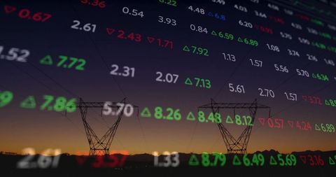 Transmission Towers at Dusk with Stock Market Overlays