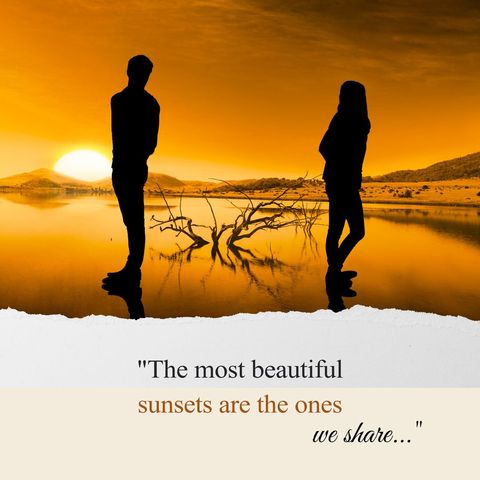 Silhouette Couple Enjoying Romantic Sunset at Lakeshore