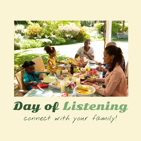 African american family having dinner outdoors in sunny garden