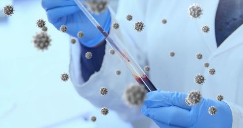 Medical professional collecting sample amidst floating virus cells