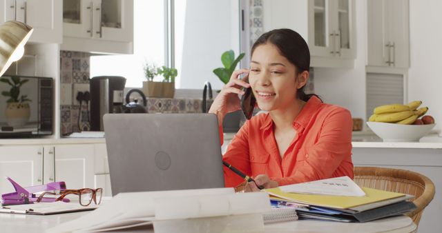 Young Woman Working Remotely from Modern Home Kitchen - Download Free Stock Images Pikwizard.com