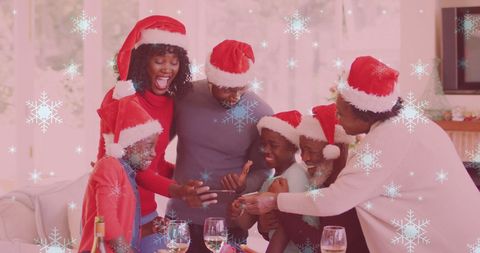 Joyful Family Gathering in Santa Hats Celebrating Christmas