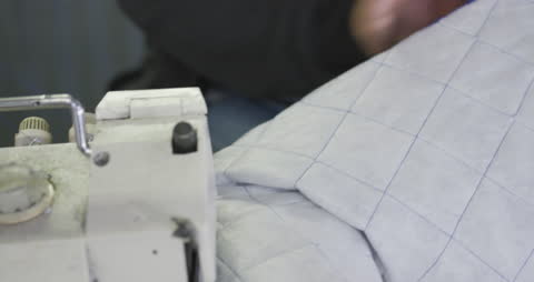 Close-up of Quilting Process in Sportswear Manufacturing