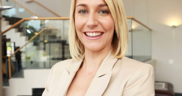 Smiling Blonde Businesswoman Standing Confidently - Download Free Stock Images Pikwizard.com