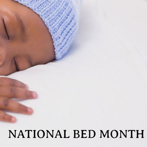Serene baby sleeping peacefully during national bed month celebration