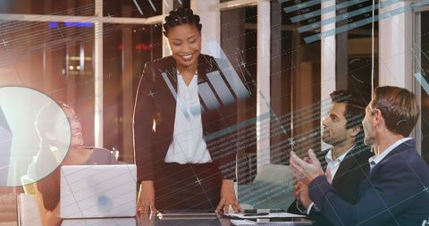 Diverse Business Team Engaged in Data Visualization Meeting