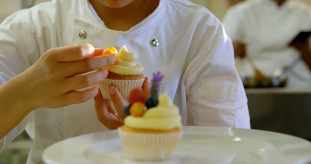 Pastry Chef Decorating Cupcakes with Fresh Fruit - Download Free Stock Images Pikwizard.com