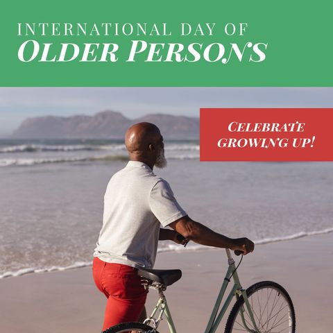Senior Man Enjoying Beach with Bicycle on Older Persons Day