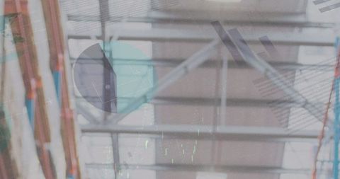 Empty warehouse with data overlay illustrating global shipping