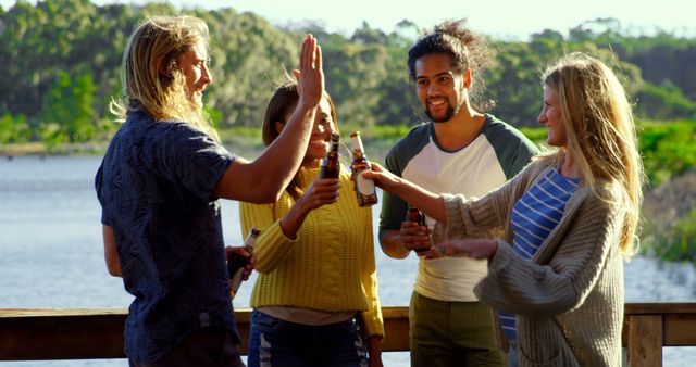 Group of Friends Enjoying Lake Cabin Retreat with High Five - Download Free Stock Images Pikwizard.com