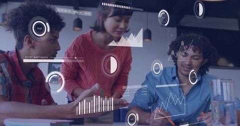Diverse business team collaborating with data charts and graphs overlay