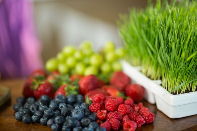 Close-up of fruits and herbs on the counter at health grocery shop