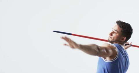 Male Athlete Practicing with Javelin against White Background - Download Free Stock Images Pikwizard.com