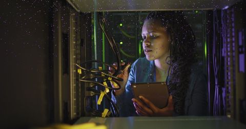 Female IT Engineer Configuring Server Room Network - Download Free Stock Images Pikwizard.com