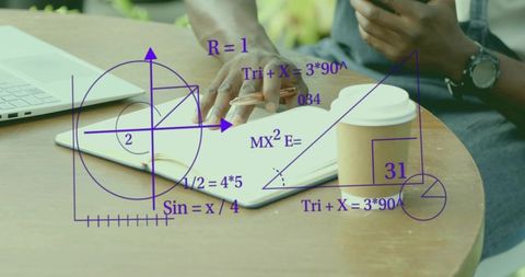 Focused Man Studying Math with Laptop and Coffee