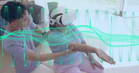 Caregiver guiding senior woman wearing vr headset while augmented waveform overlay illustrates data