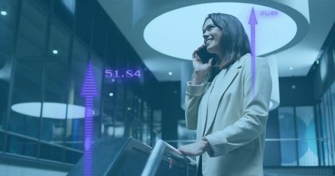 Businesswoman Analyzing Financial Data through Phone