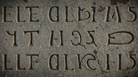 Ancient Stone Slab with Carved Latin Script at Archaeological Site - Download Free Stock Images Pikwizard.com