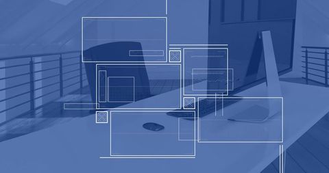 Ui wireframe overlays on modern office desk workspace