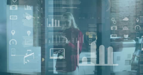 Businesswoman Analyzing Digital Interfaces in Modern Office