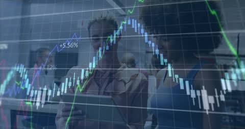 Diverse Colleagues Analyzing Financial Data on Tablet