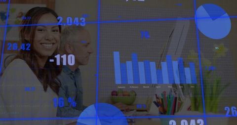 Woman Analyzing Data Charts on Computer in Modern Office