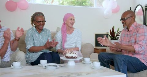 Senior Friends Celebrating with Cake and Coffee Together Smiling