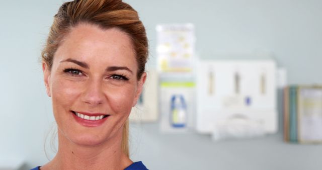 Smiling Female Medical Professional in Clinic - Download Free Stock Images Pikwizard.com