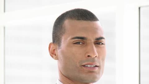 Confident Ethnic Man Smiling Embracing Natural Light